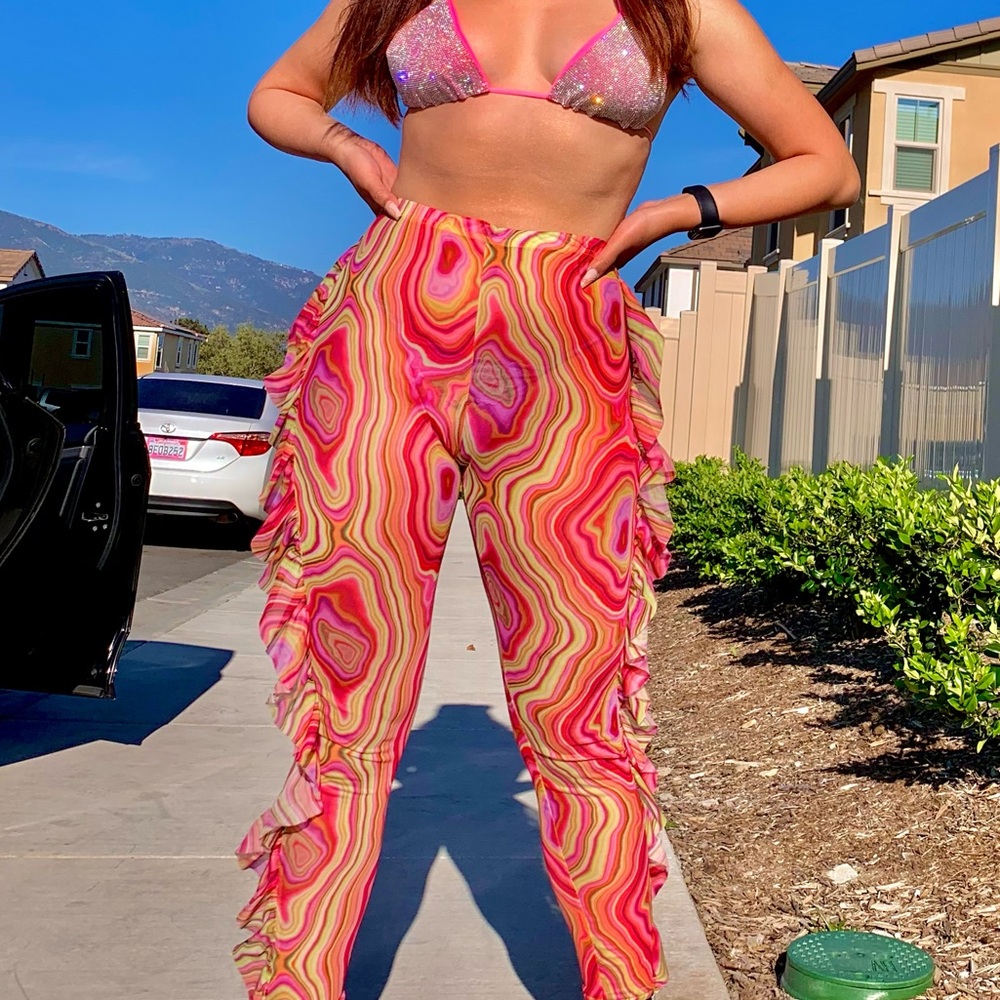 Rave box pink studded bra and tye-dye ruffle mesh pants